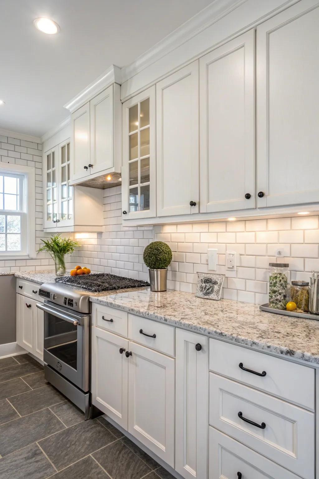 A traditional brick-shaped tile <strong><em>wall covering</em></strong> enhances the ivory cabinets and stone worktops flawlessly.” loading=”lazy” class=”pimg”>
	</picture><figcaption>A traditional brick-shaped tile <strong><em>wall covering</em></strong> enhances the ivory cabinets and stone worktops flawlessly.</figcaption></figure>
<p>Brick-shaped tiles in a gentle off-white or pale-grey can provide an ageless appearance that integrates beautifully with ivory cabinets. I’ve incorporated this in a client’s dwelling, and it instantaneously fashioned a pristine and luminous environment.</p>
<h3>Useful items to consider:</h3>
<ul class=