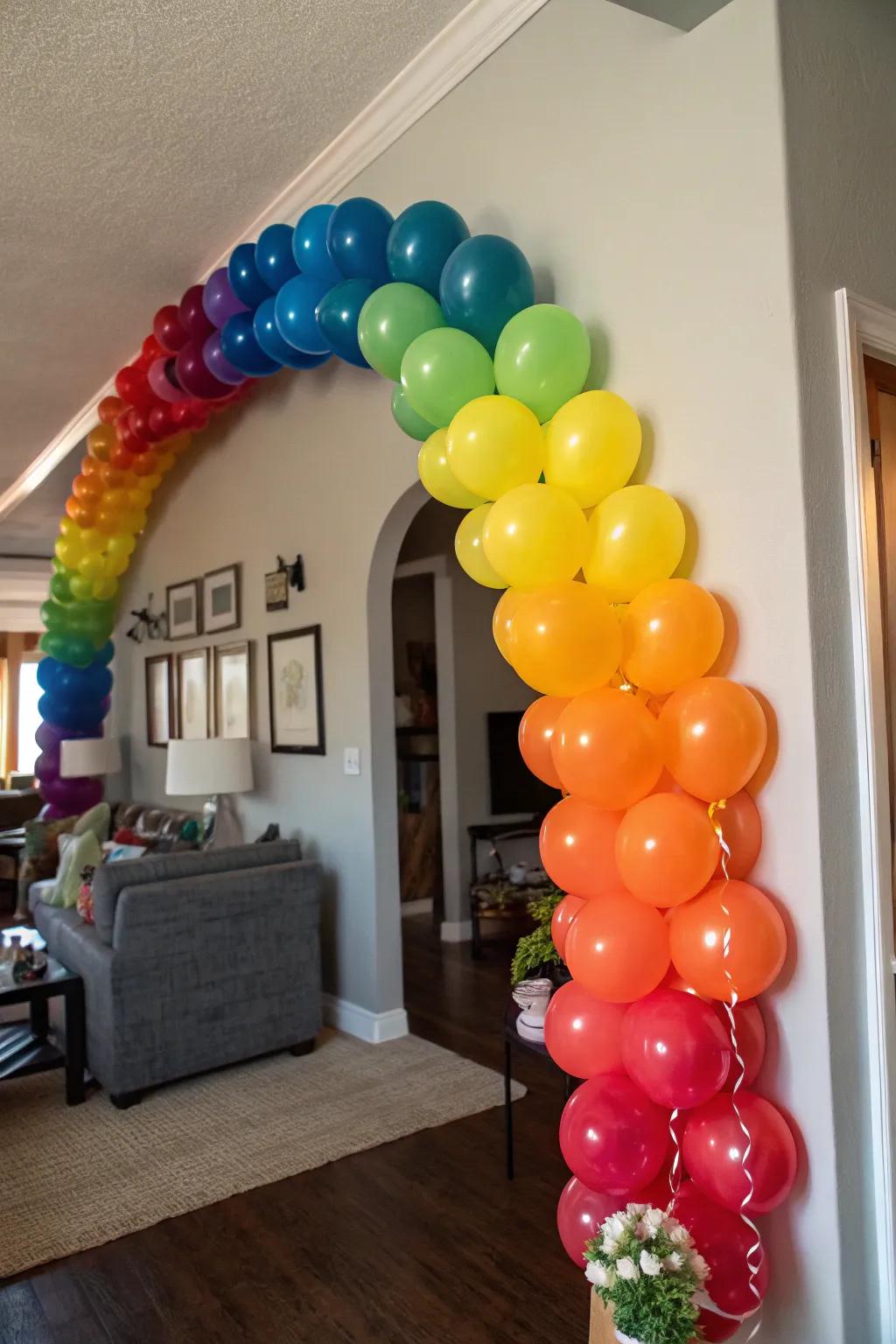 Rainbow balloon garland brightening up a festive room.