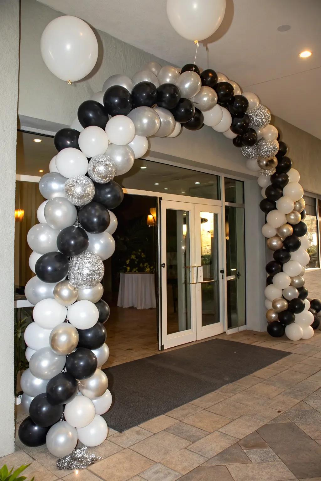A polished balloon ornamentation in onyx, argent, and pure tones.