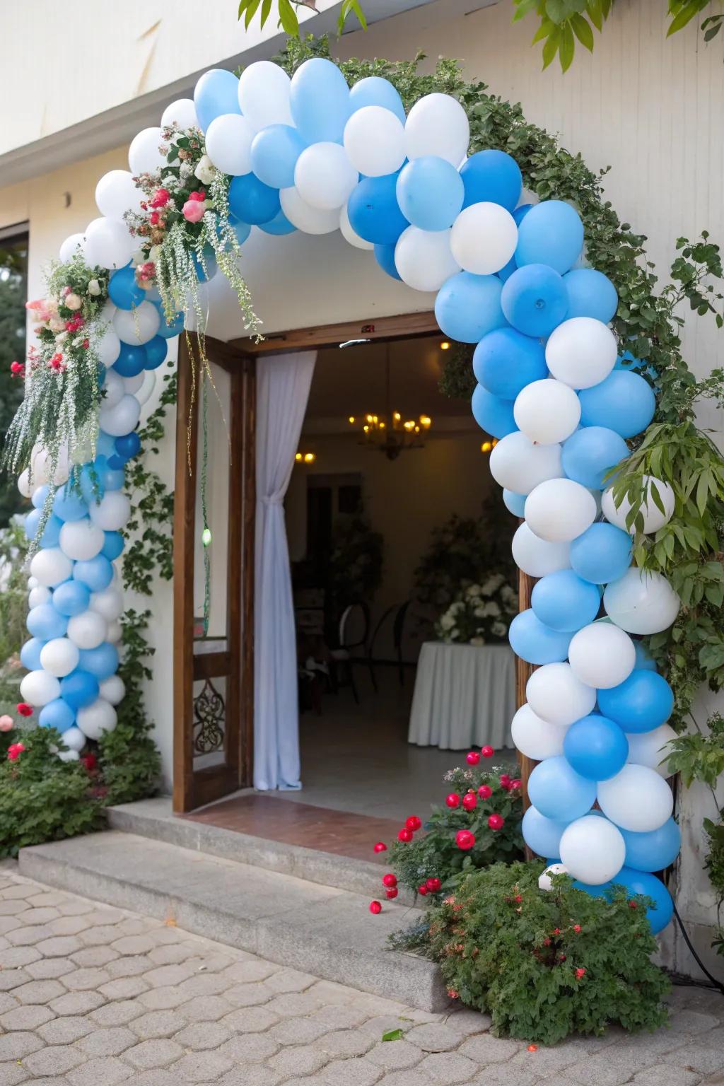 A welcoming blue and white inflatable arch sets the tone for your event.