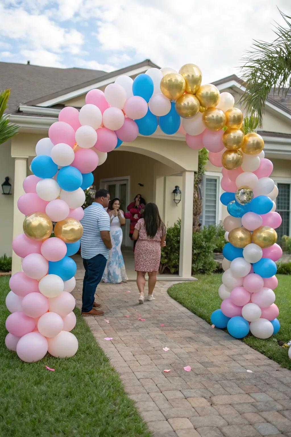 A lively balloon arch is the perfect backdrop for a joyful gender reveal celebration.