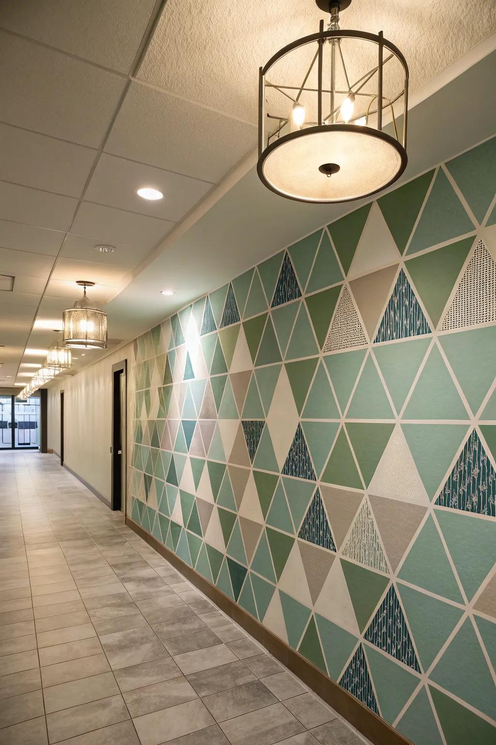 A hallway given new life with a geometric wall displaying overlapping triangle patterns.