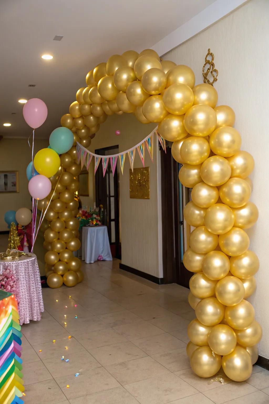 A brilliant gold balloon entrance makes a grand statement.