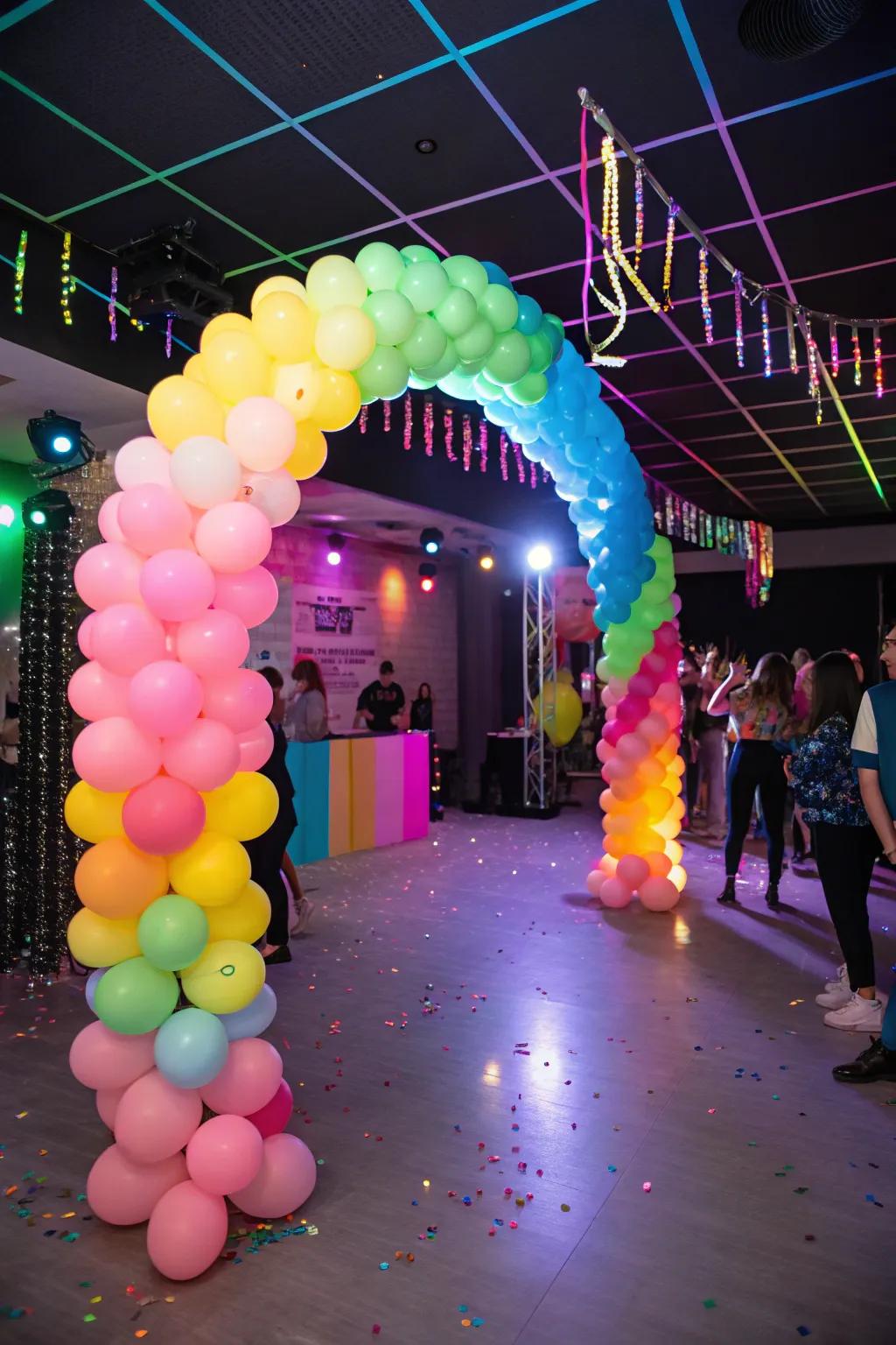 A bright neon balloon arch sets a fun retro vibe as soon as guests arrive.