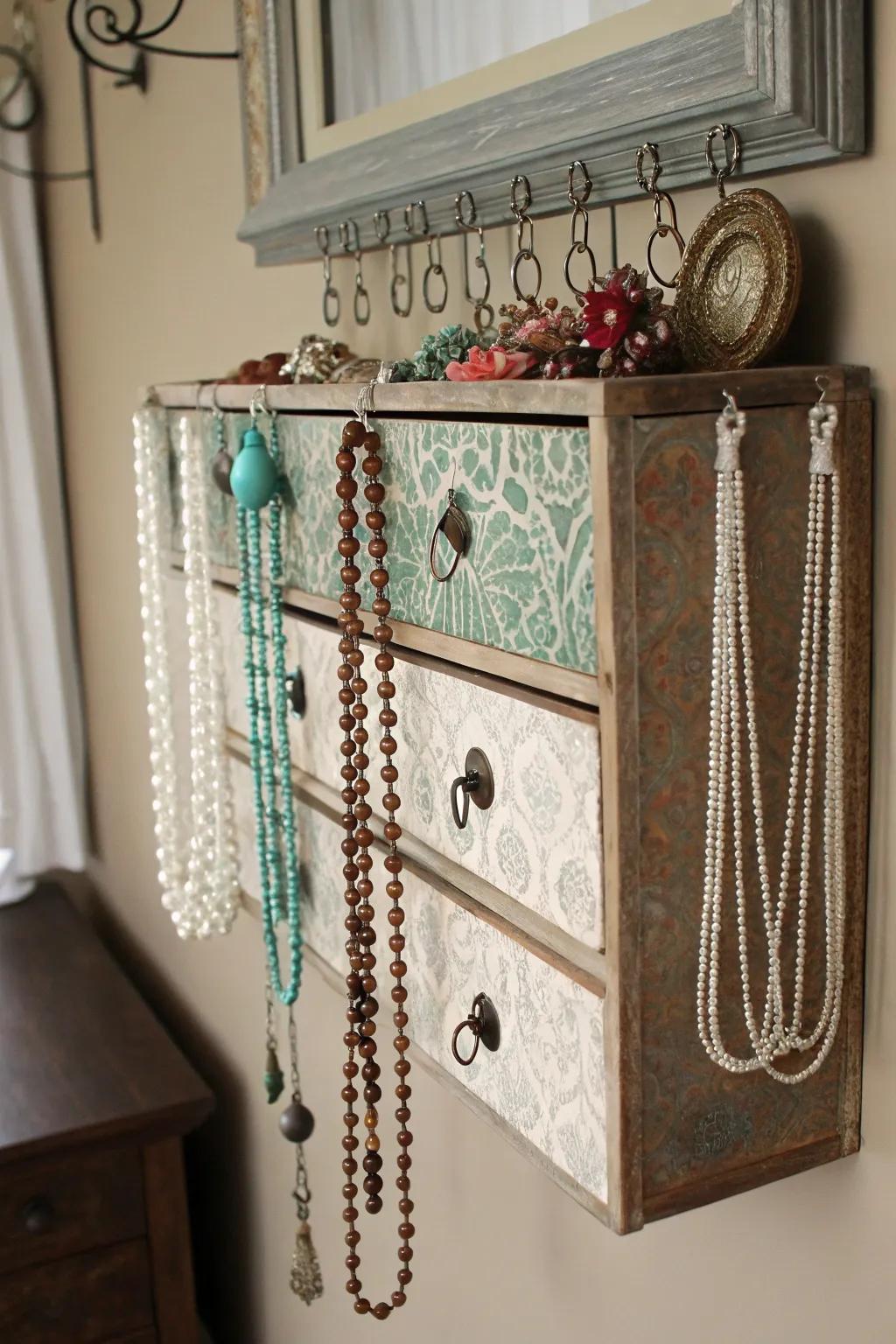 A vintage drawer transformed into a chic necklace holder