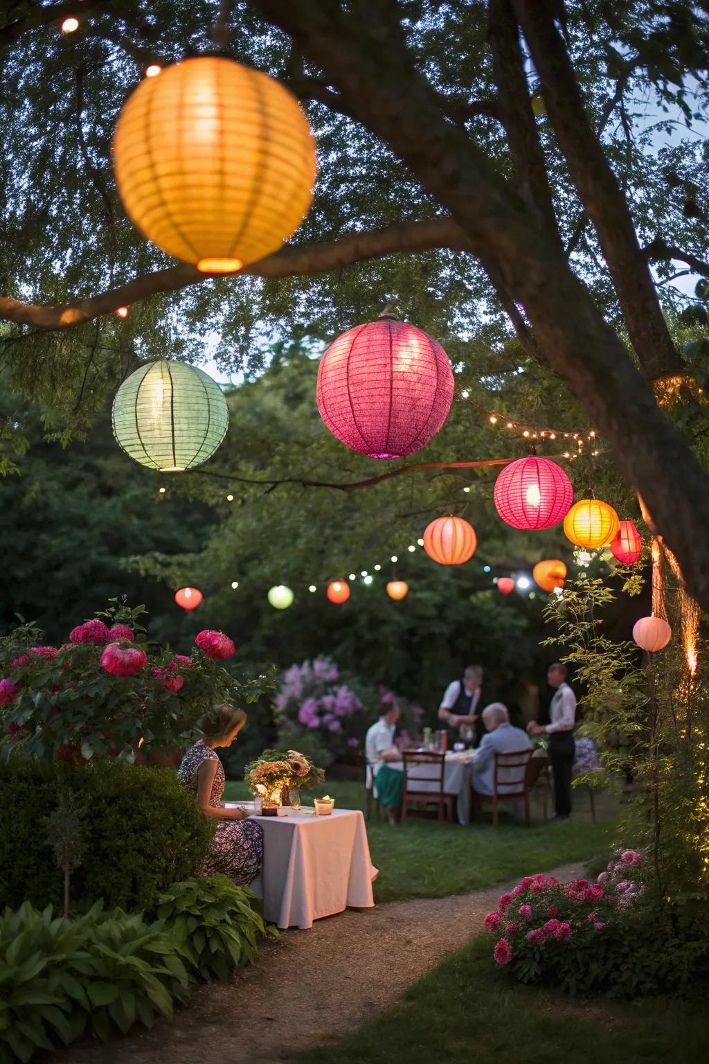 A colorful assembly of paper lanterns introduces a sense of fun to an outdoor party.