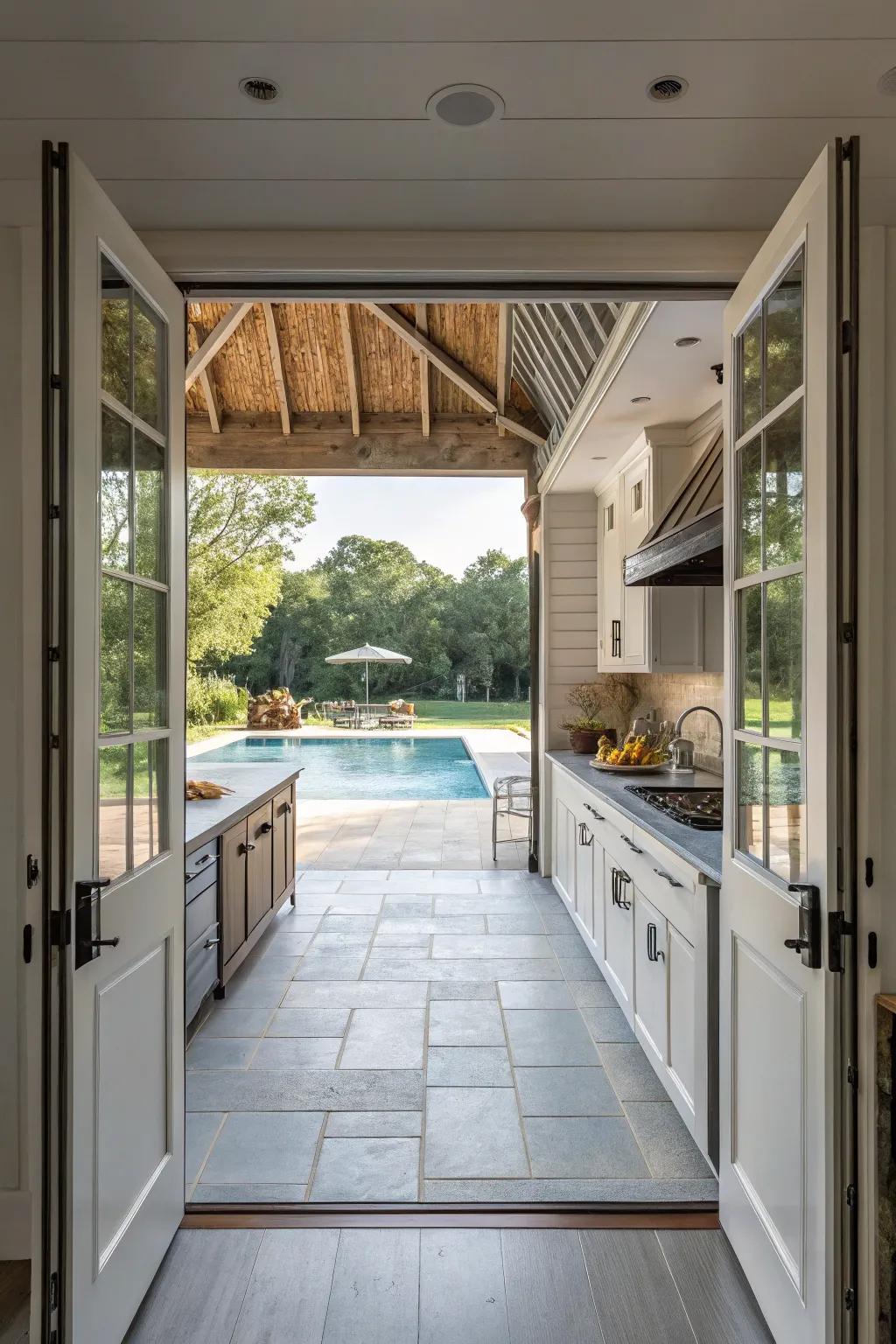 Open-air kitchenette design that effortlessly connects with the pool area.