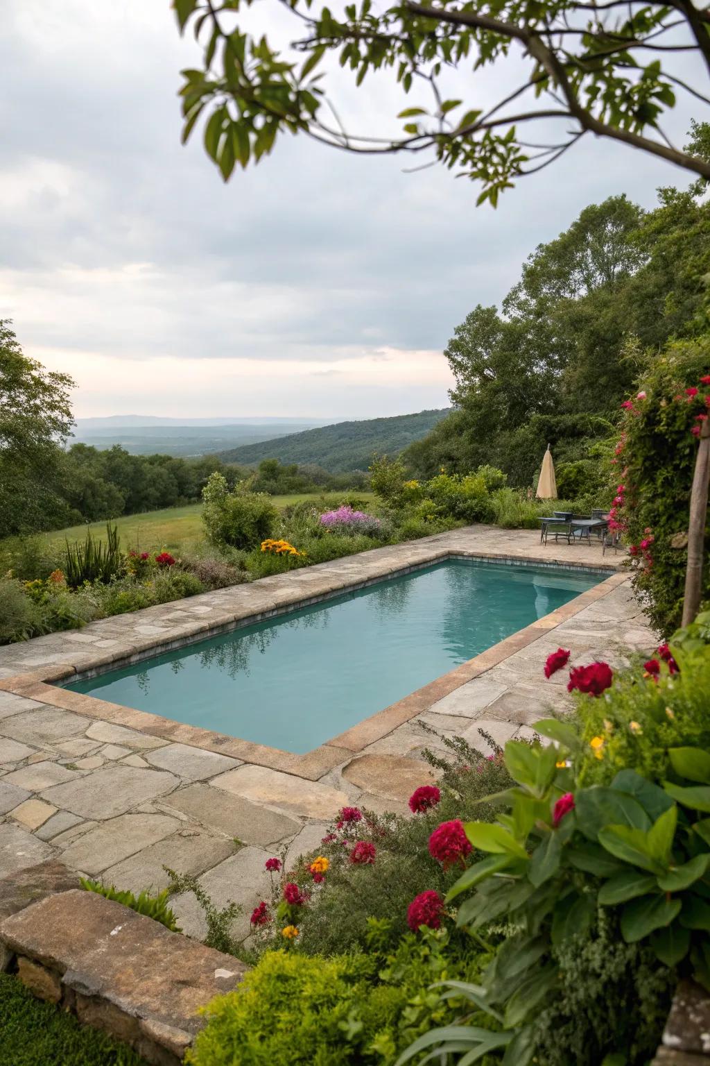 Refined stone decking provides a beautiful complement to the rectangular pool.
