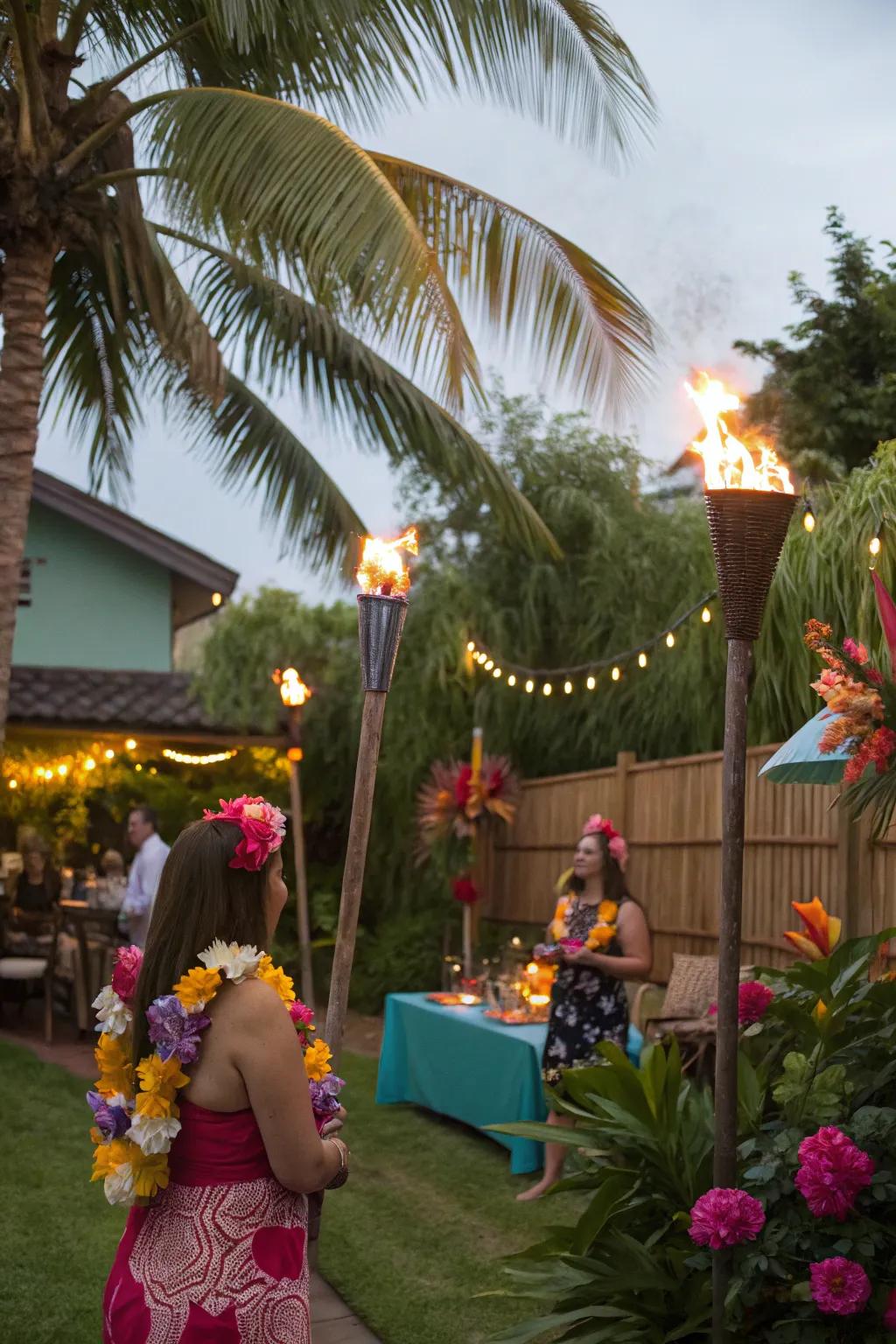 Attendees relishing a tropical festivity, complete with flaming posts and orchid necklaces.