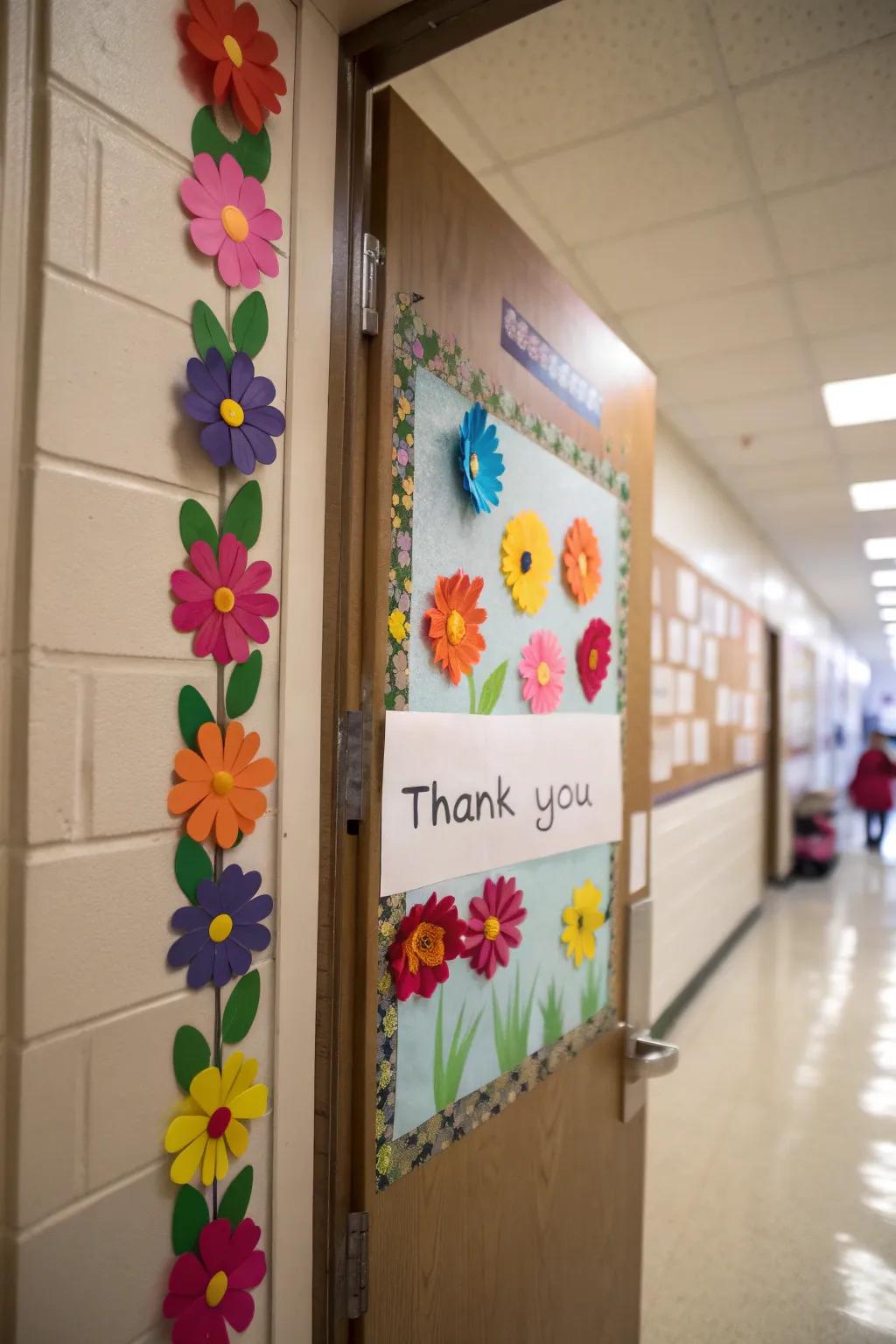 A garden of gratitude with blooming flowers on a classroom door.