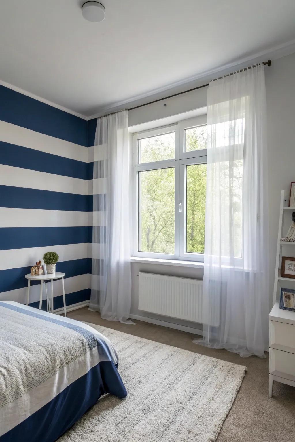 A bedroom showcasing deep sea blue and crisp white walls, radiating a timeless and invigorating atmosphere.