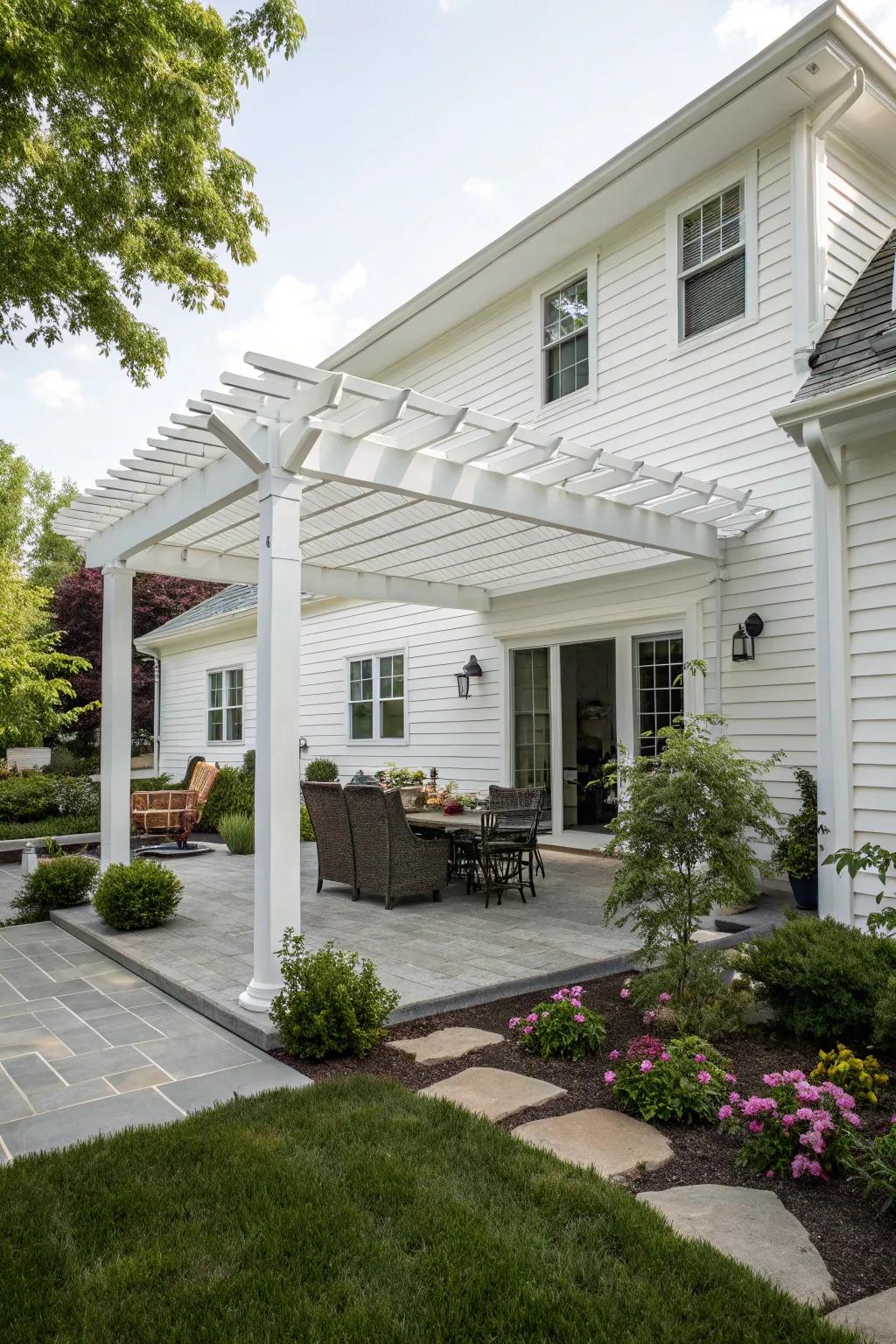 A stylish white pergola providing shade and beauty to the outdoor area.