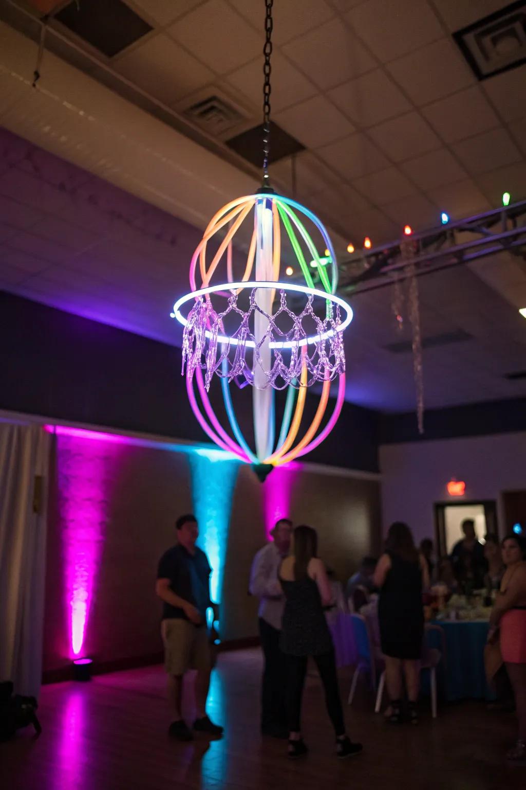 A sparkle wand chandelier illuminates your party using vibrant hues.