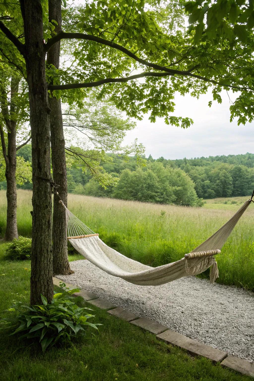 Unwind via a hammock placed above a stone base.