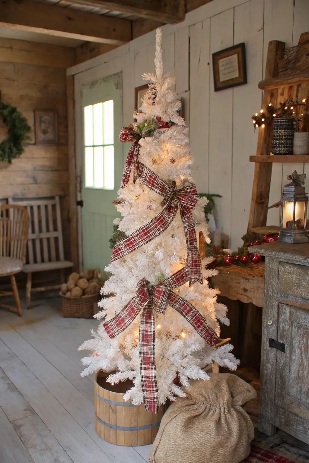 A countryside charm-themed white pencil tree using fabric and plaid.