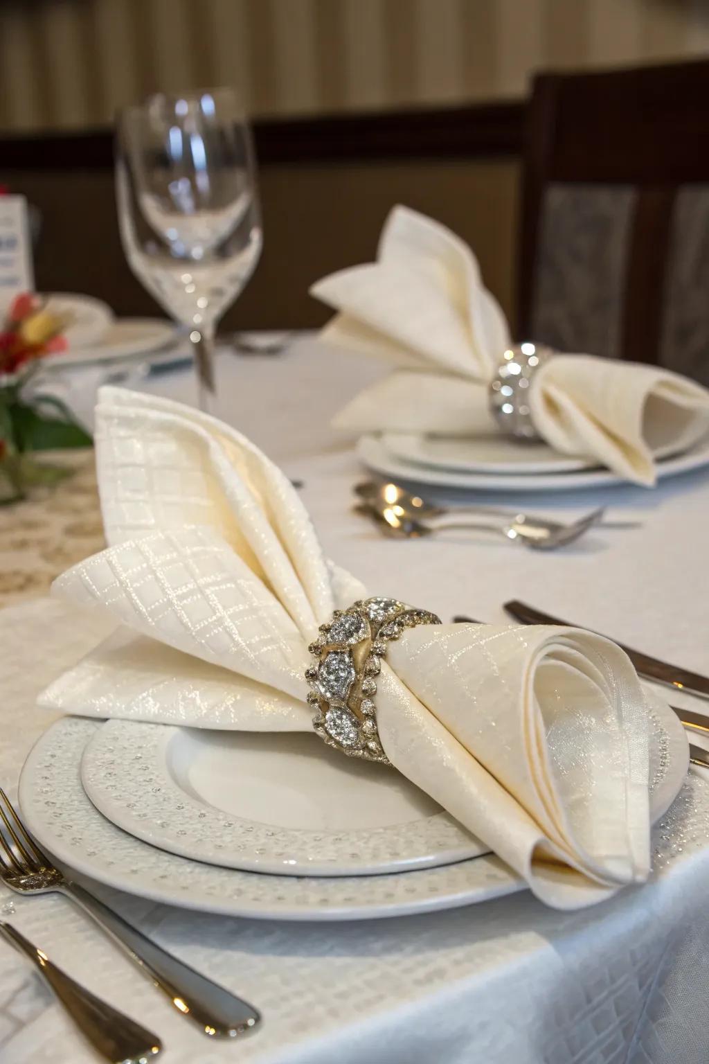 Chic napkin presentation using rings and folds