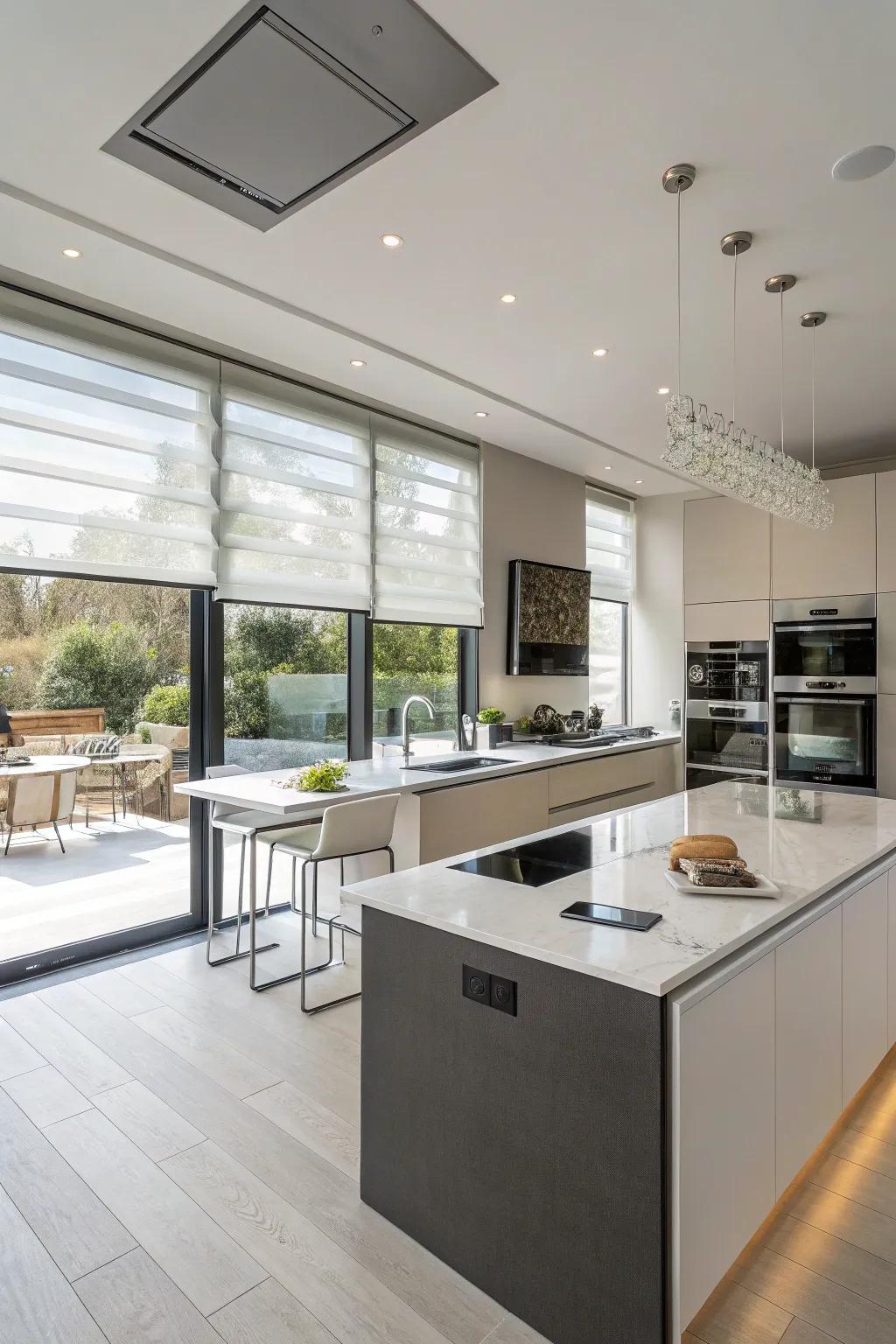 High-tech kitchen featuring automated window treatments
