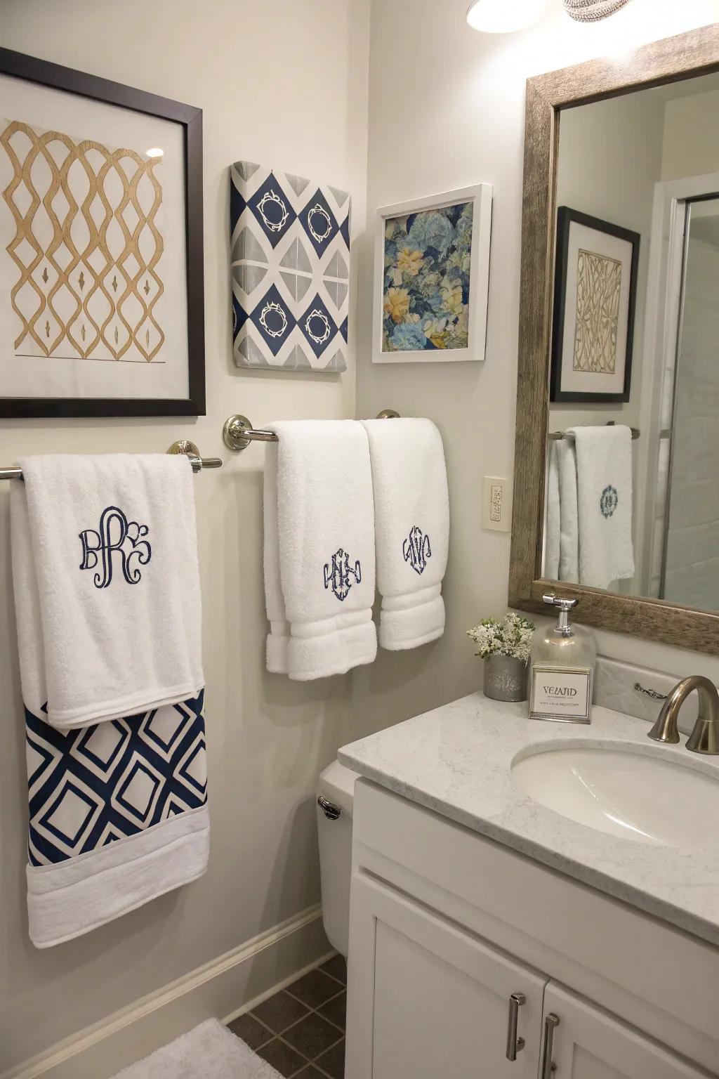 A bathroom with personalized essences including monogrammed fabrics and custom art.