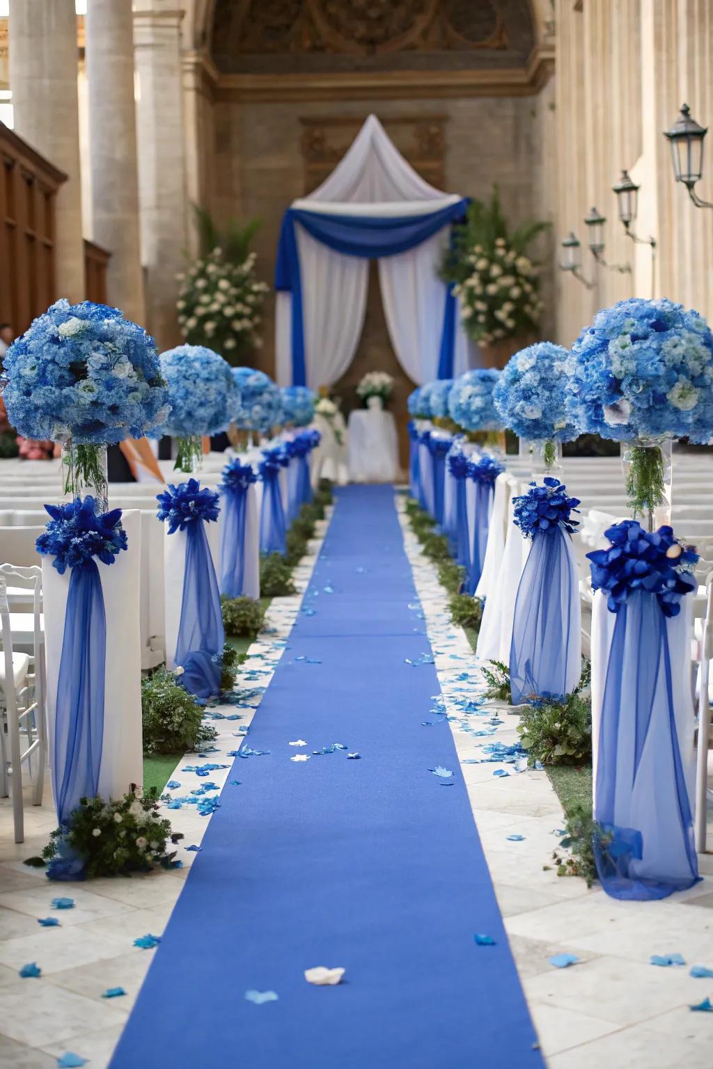 A beautifully decorated ceremony pathway with sapphire splendor accents.