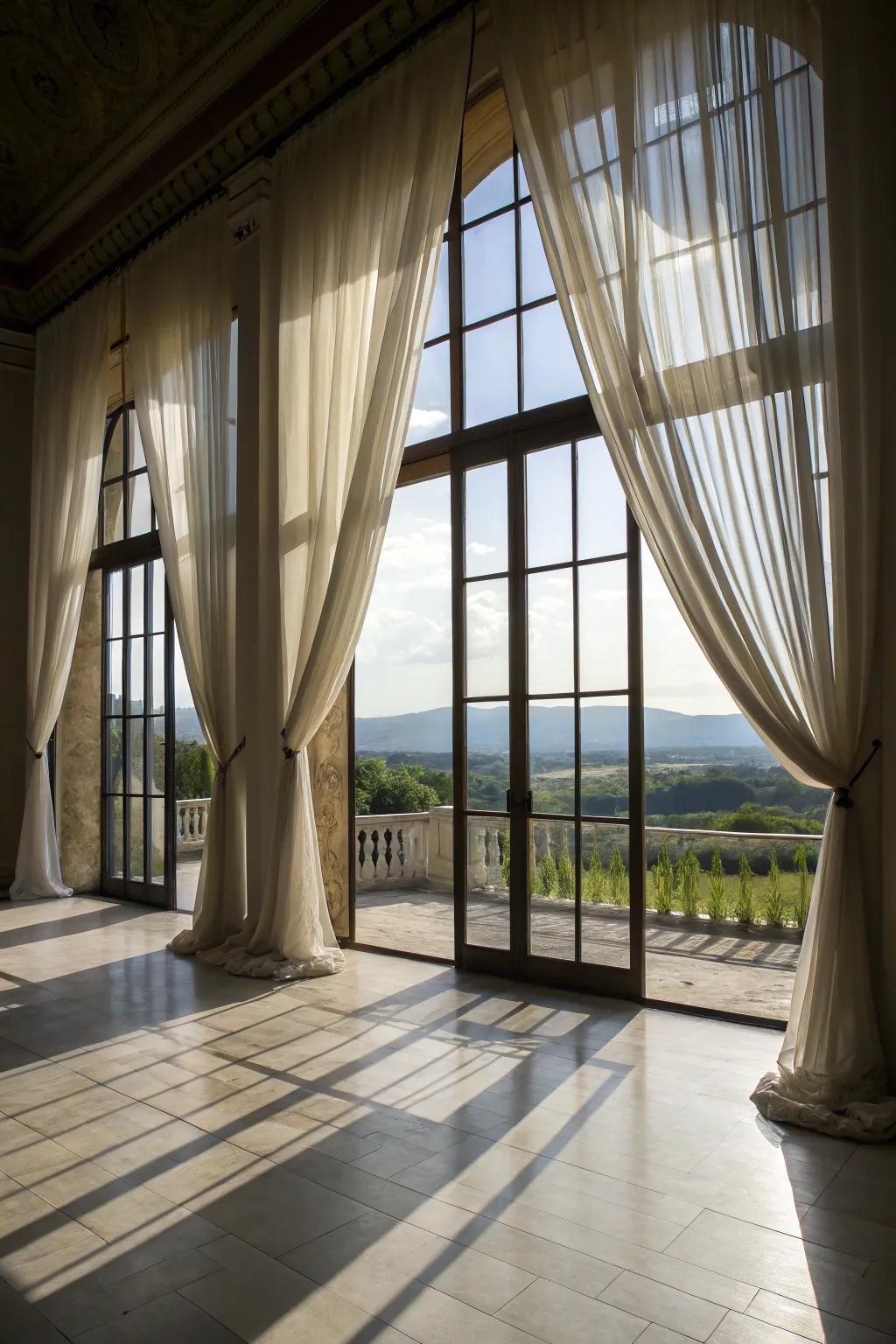 Ceiling-to-floor drapes for a theatrical effect.