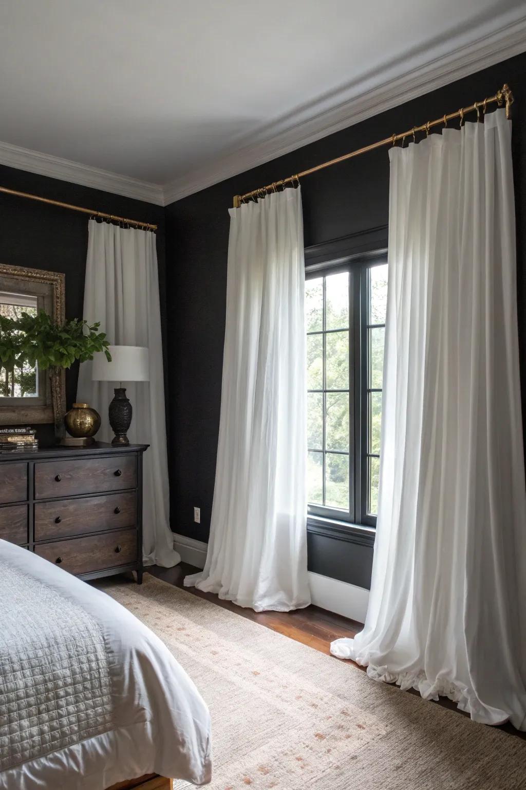 Ivory drapes furnish a striking contrast to dark constituents in the chamber.