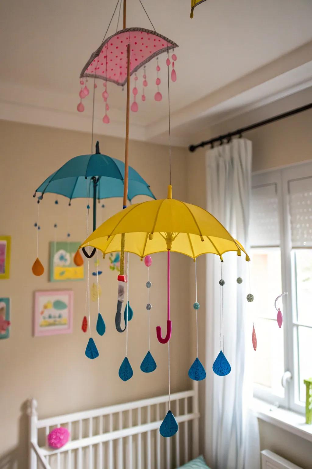 Umbrella and raindrop mobile for playful decor.