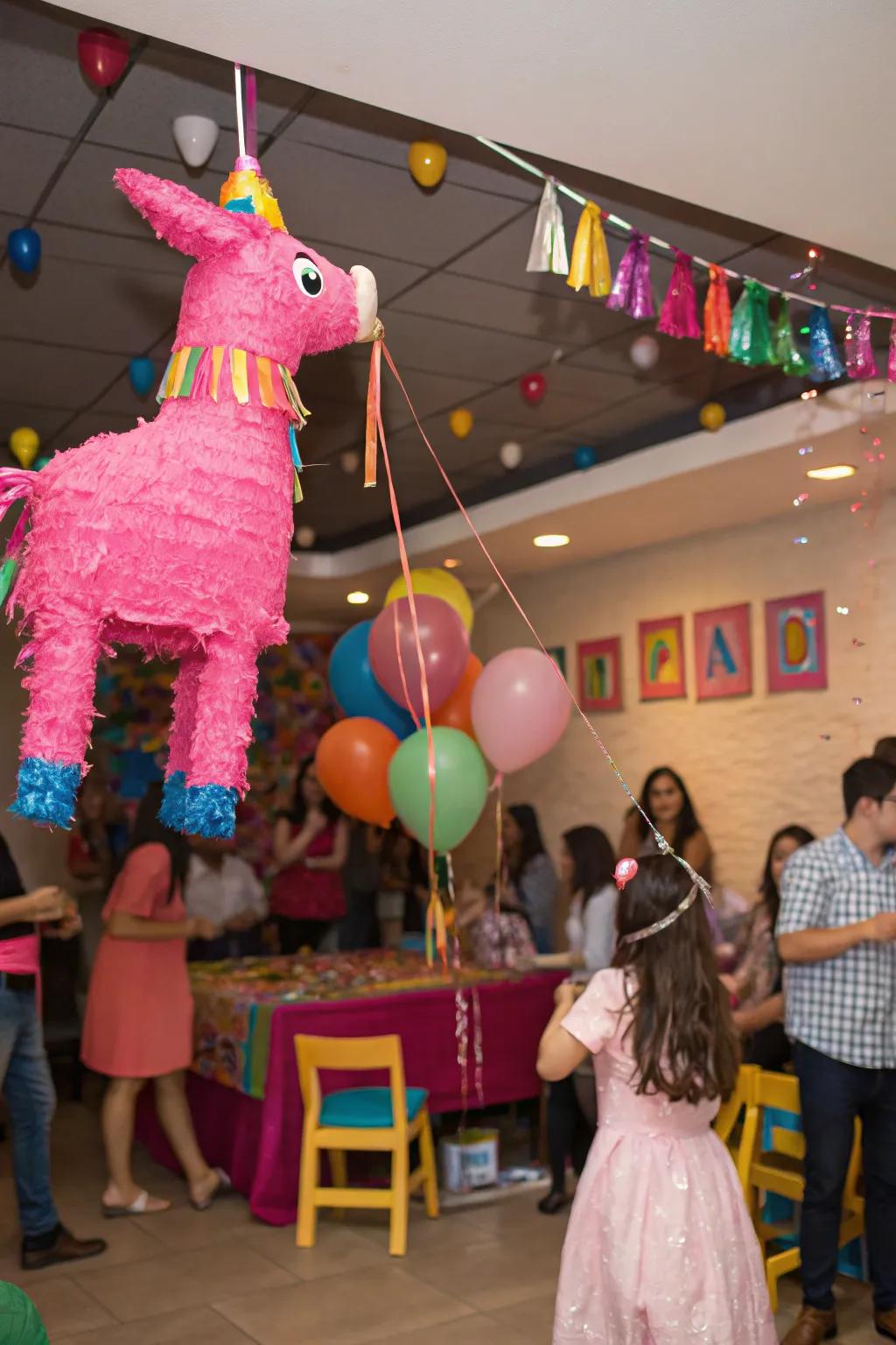 A hot pink piñata adds playful fun to the festivities.