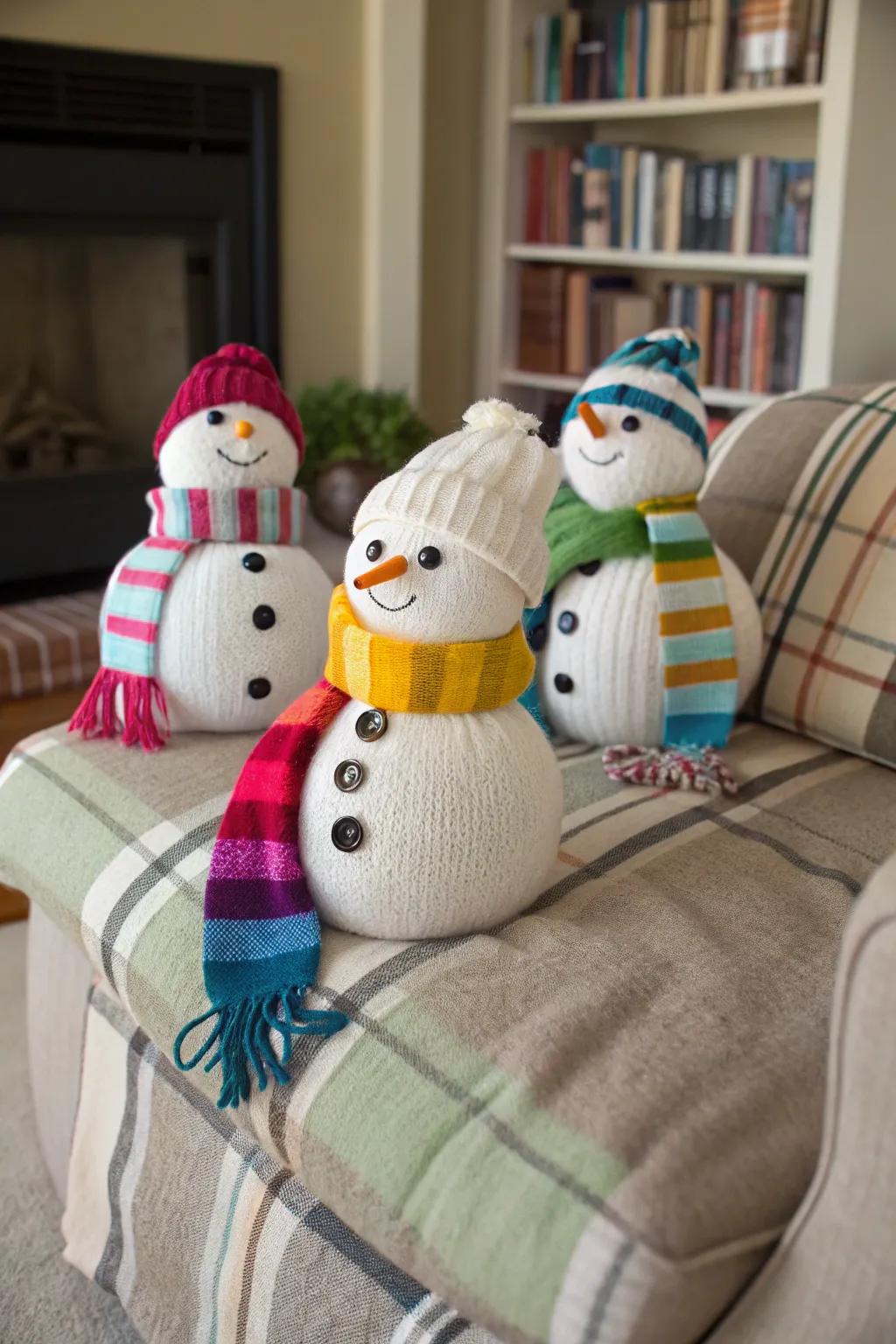 Upcycled pullover snow figures bring warmth and creativity to your space.
