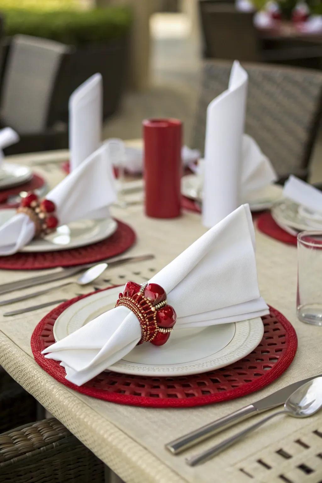 Sophisticated crimson linen clasps contributing refinement to the table.