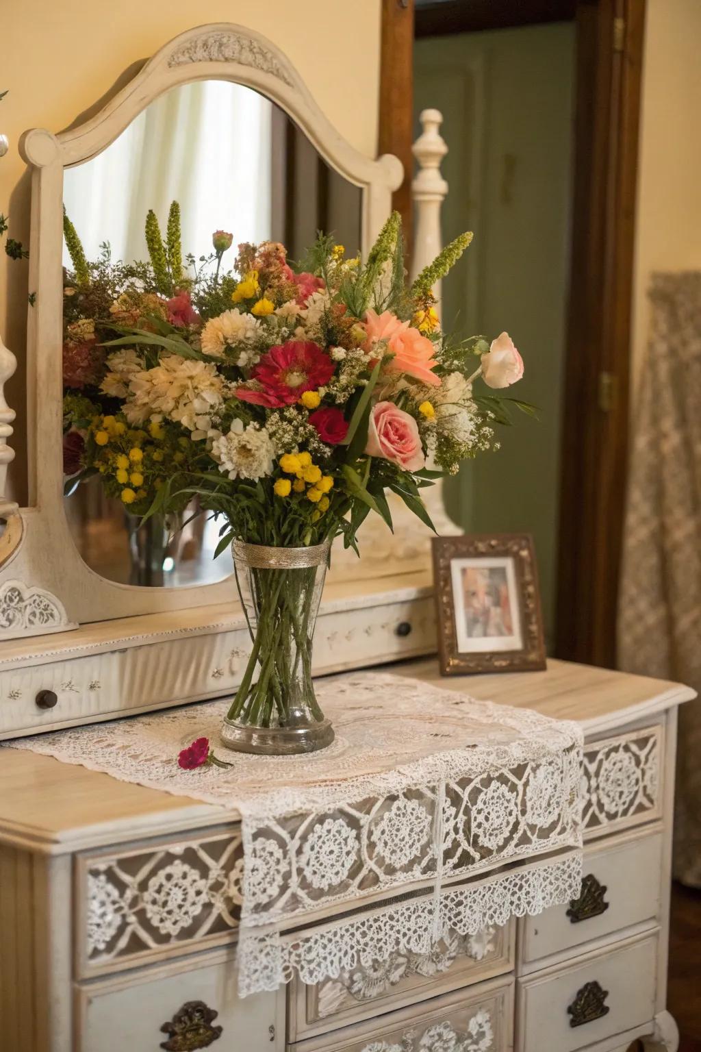 Fresh flowers contribute a vibrant and natural touch to vintage vanities.