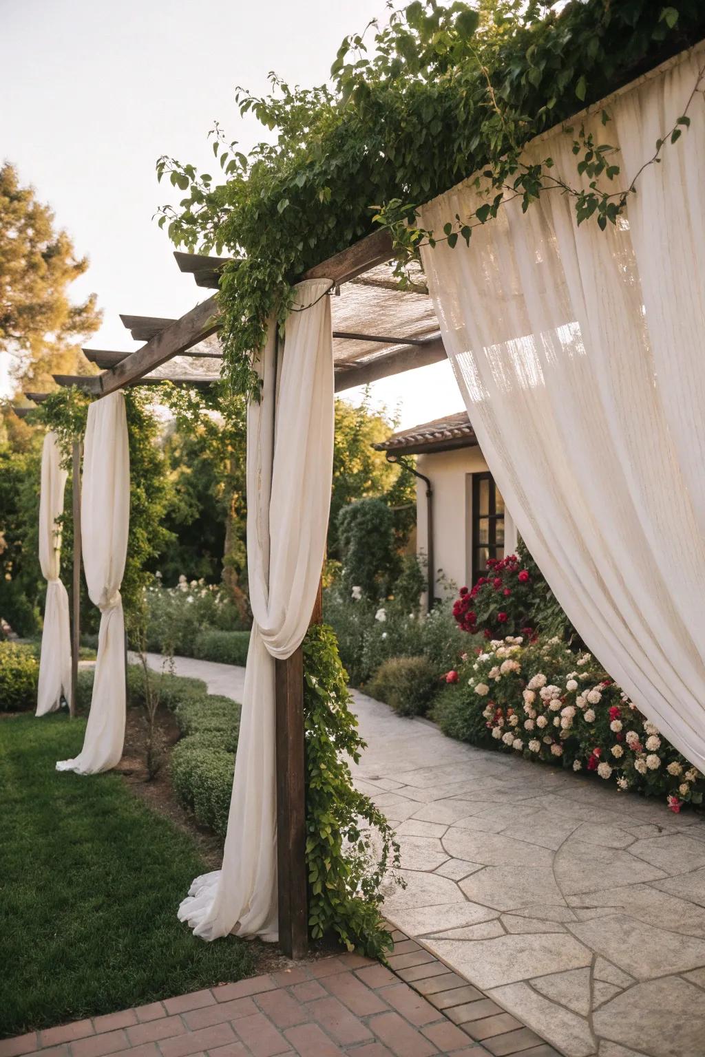 An arbor with curtains adds elegance and privacy.