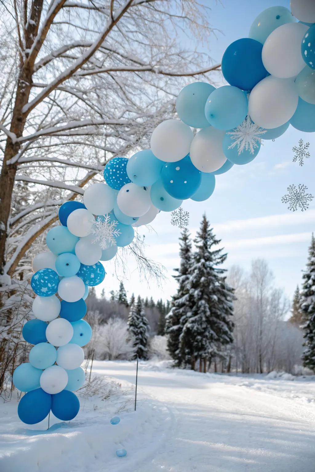 Winter wonderland balloon garland for a snowy feel.
