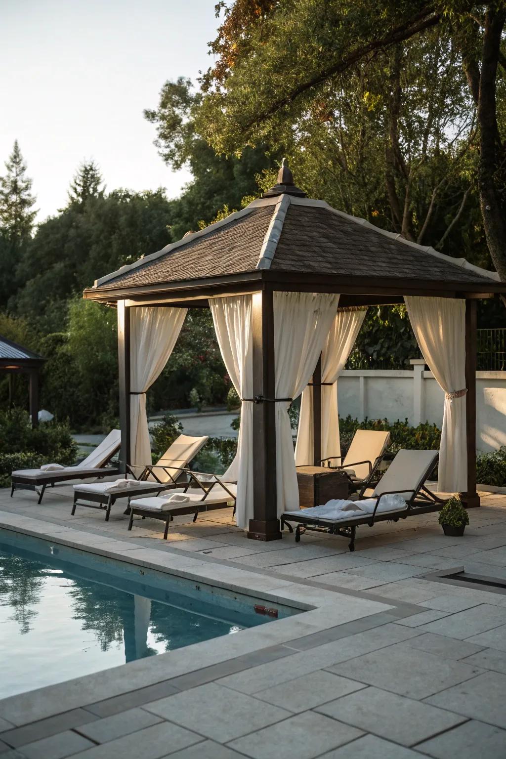 Relax poolside using a pavilion sanctuary.
