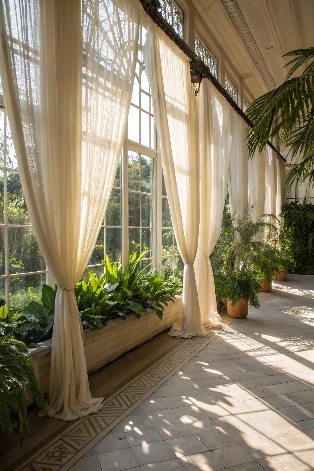 Sheer drapes elevating the airy and light impression of a sunroom.
