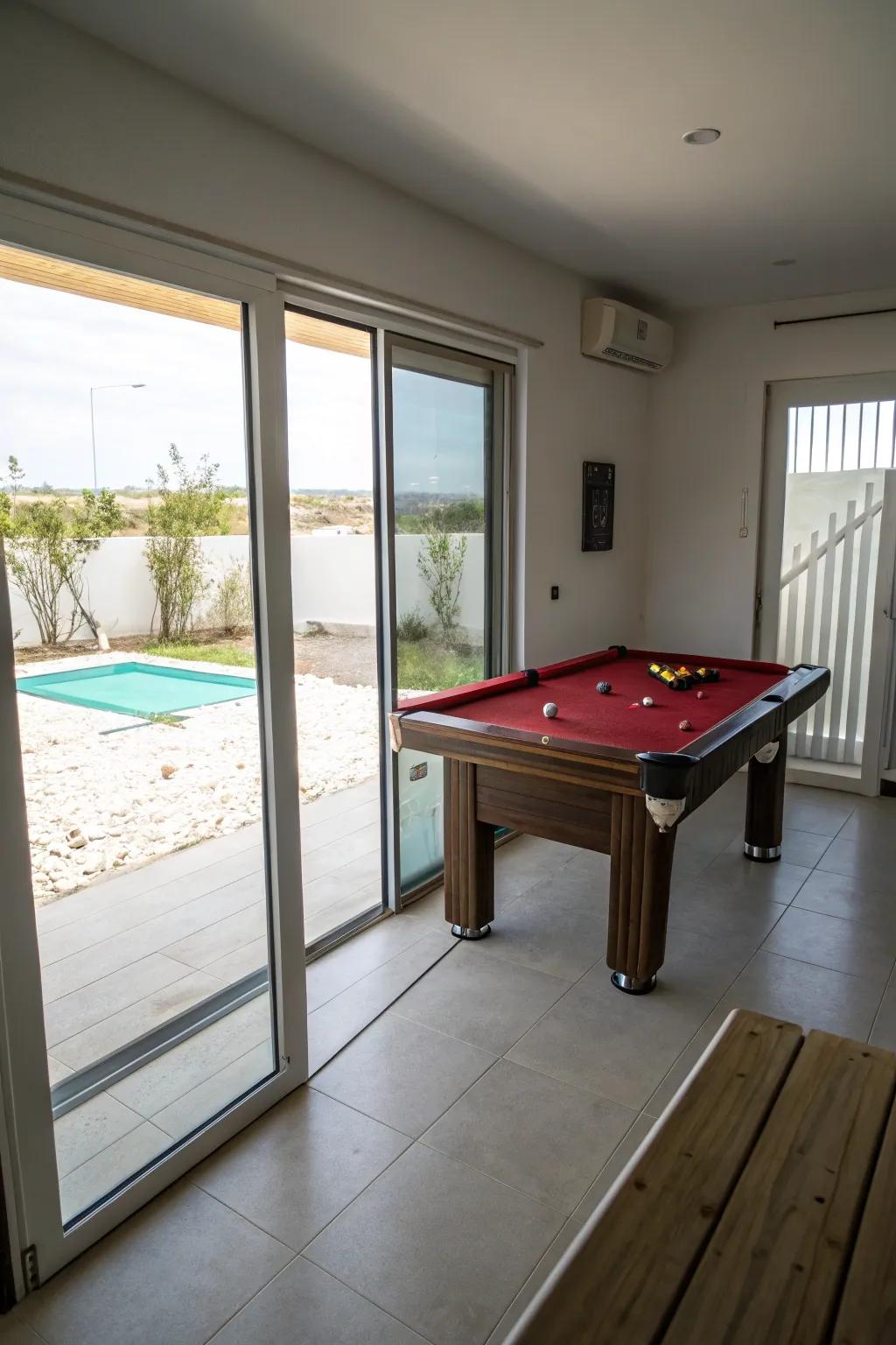 Sliding doors save space and enhance accessibility in a small pool table room.