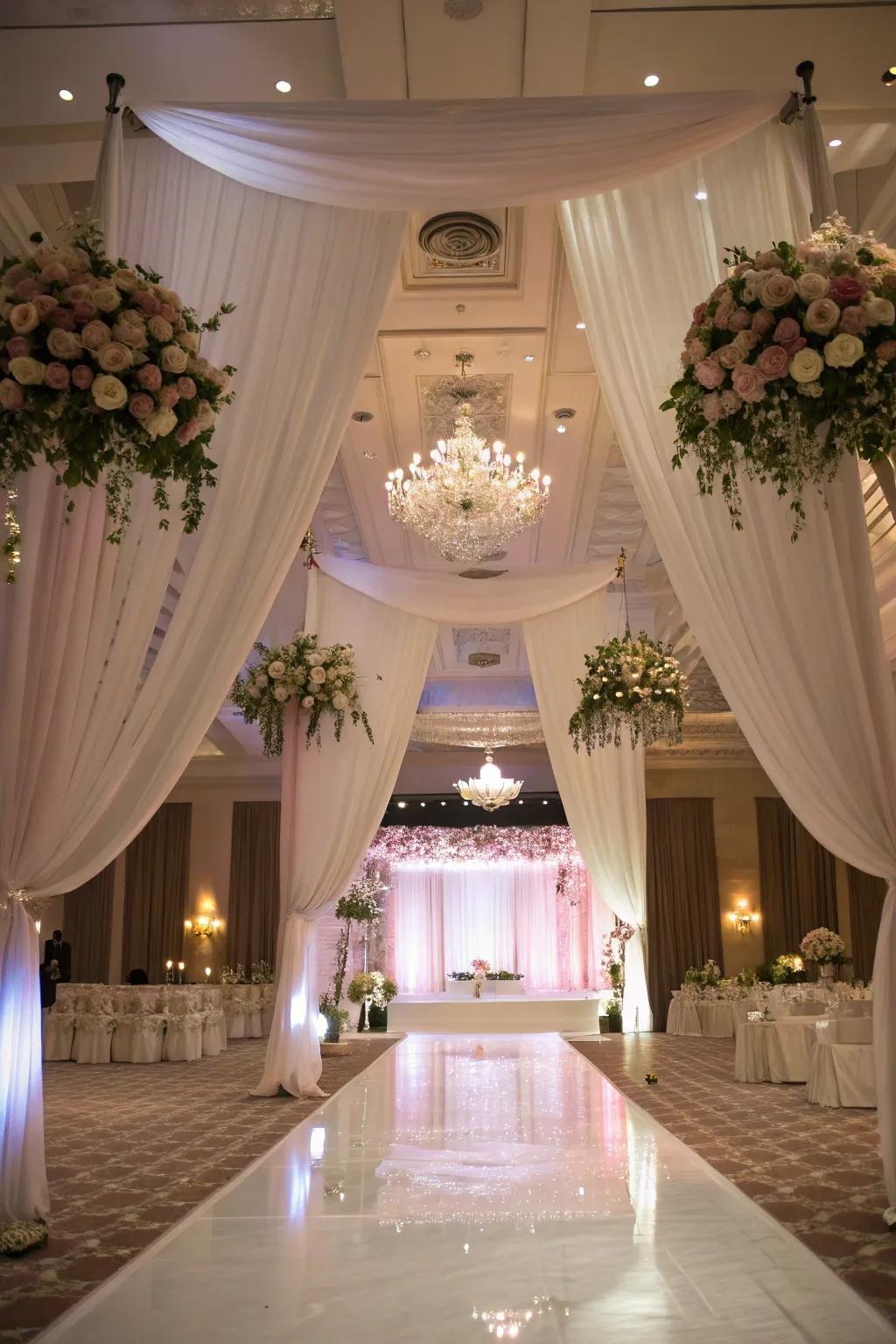 Create an unforgettable experience with fabric and hovering florals.