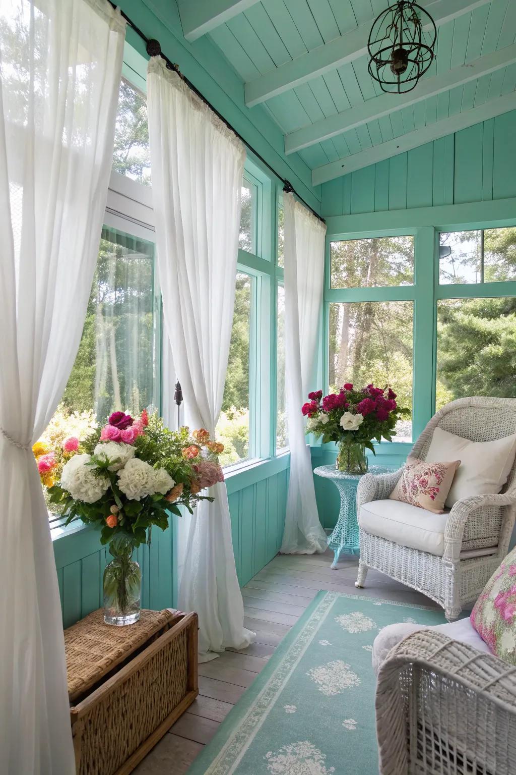 Sunroom with light aqua walls, providing a breezy and relaxing ambiance.