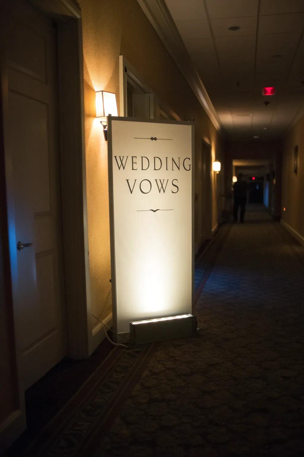 Radiant light enclosure of vows contributing warmth to a passage.
