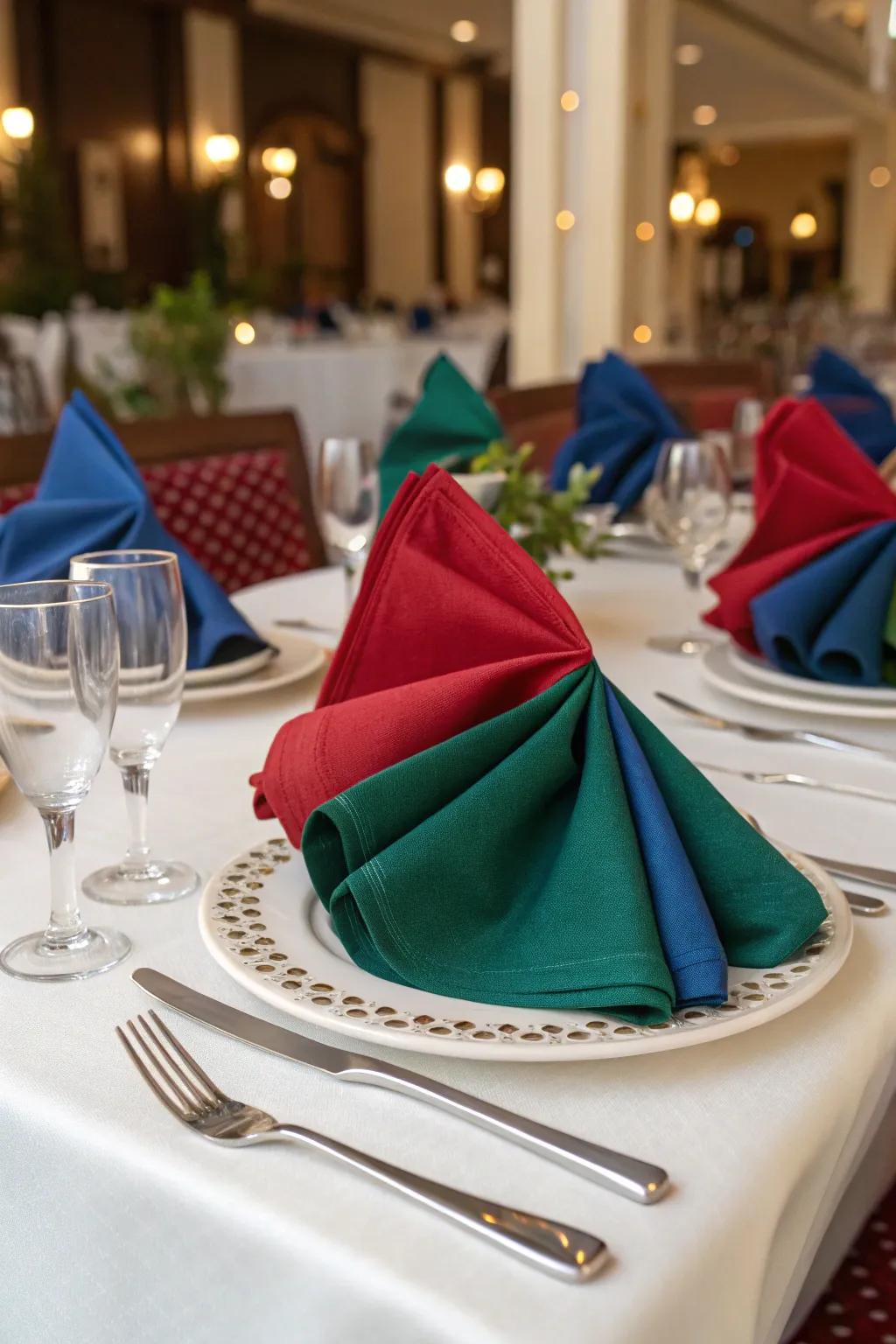 Brightly colored linens bring a lively spark to an elegant table arrangement.