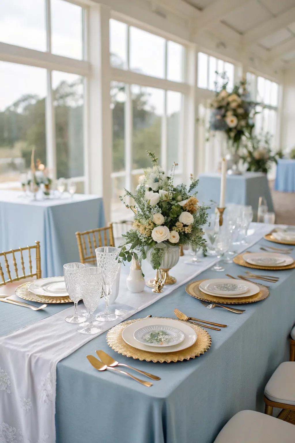 An elegant table setup featuring soft teal elements, improving any ceremony gathering.