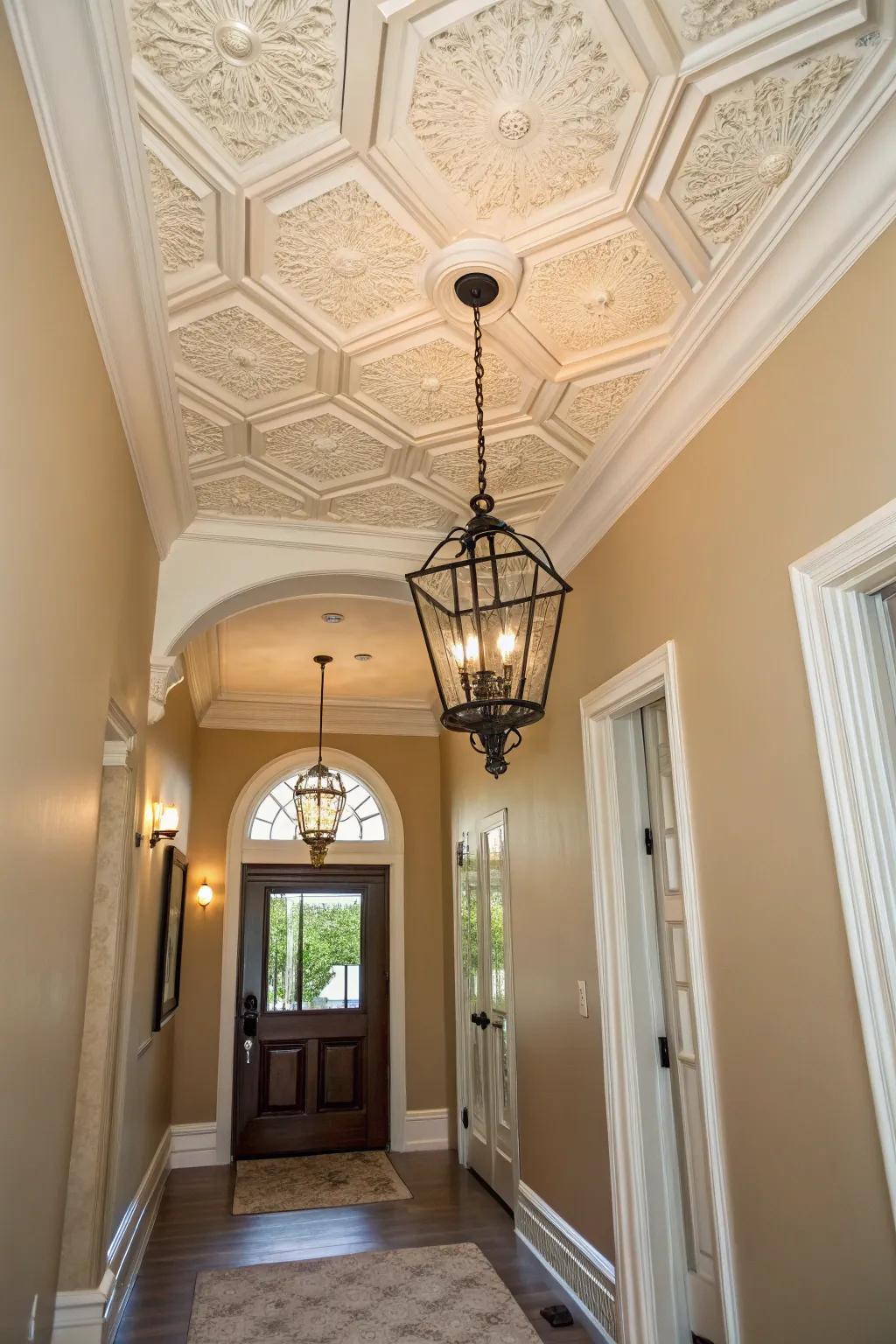 Ceiling trim elevates the entryway to a luxurious level.