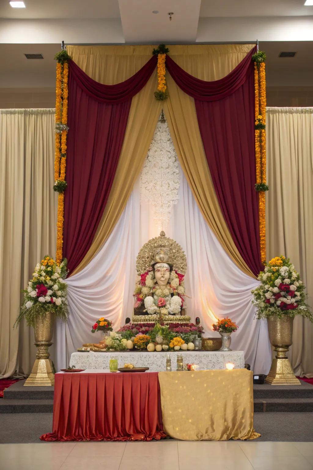 Textiles impart a regal sensation to the Ganpati arrangement.