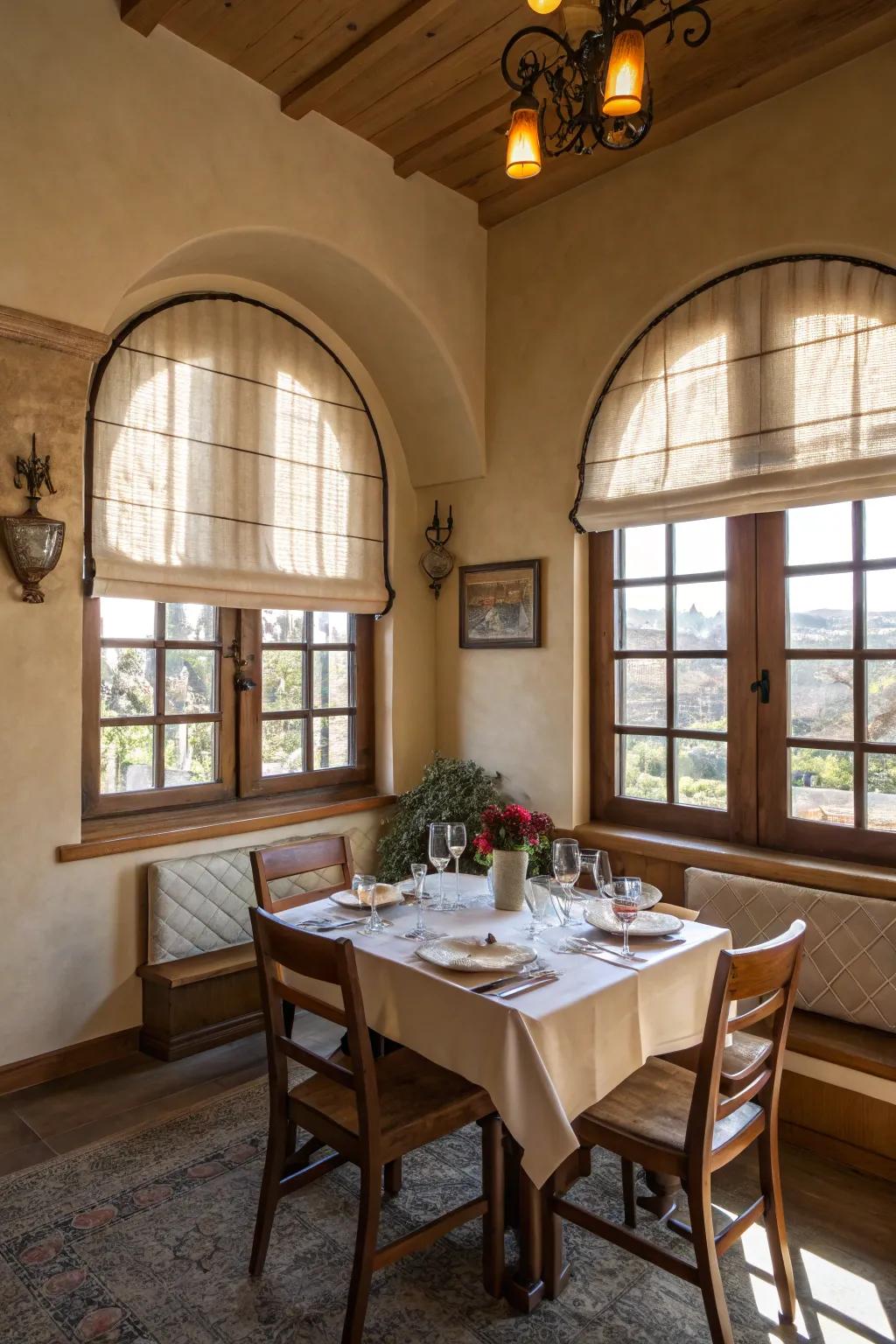 An intimate dining space showcases Roman fabrics on arched windows.