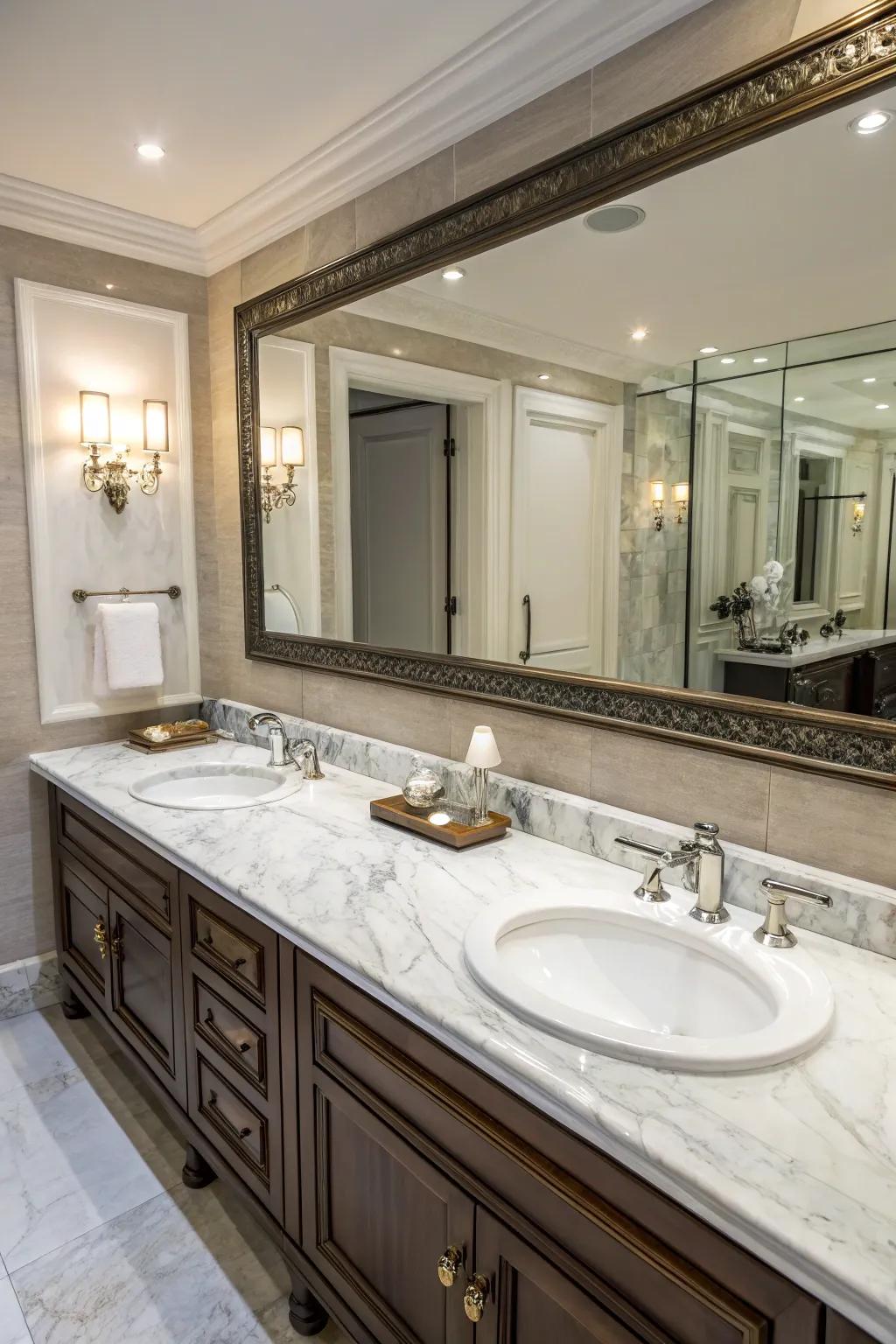 Elegant marble surfaces beautifully complement the double sinks in this high-end bathroom.