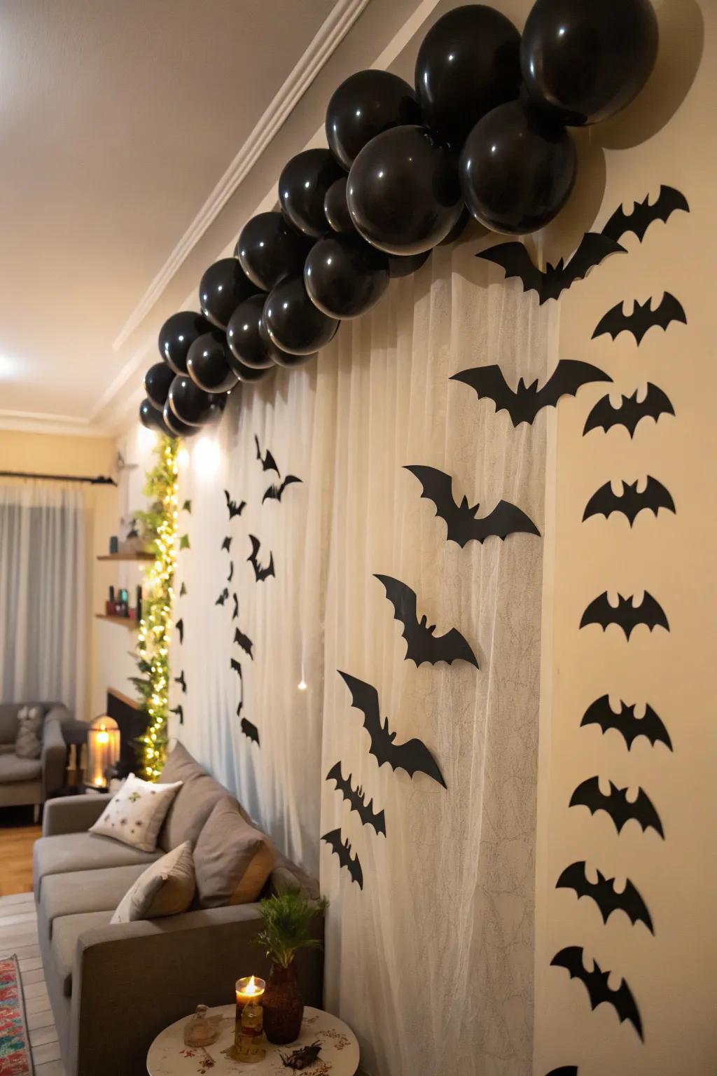 A garland of obsidian sky orbs and paper bats adds lively theatricality
