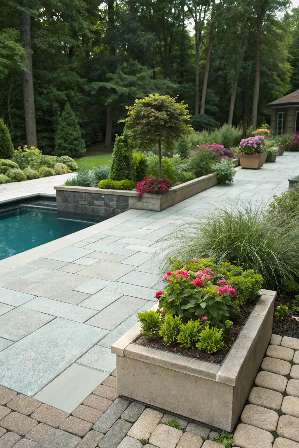 Integrated greenery with pavers offers a seamless transition to the garden.