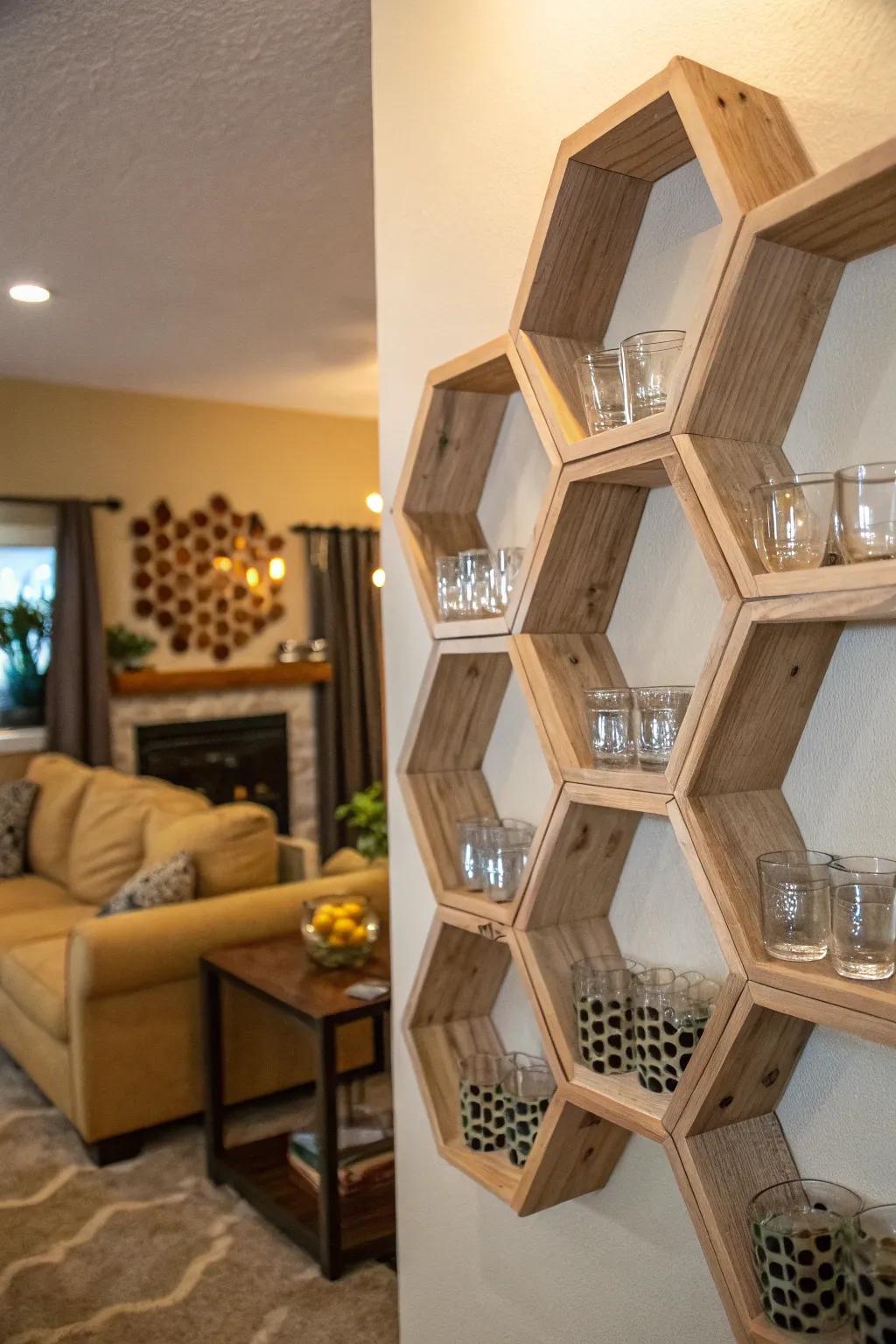 A wall in a living area showcases hexagonal platforms, upon which shot glasses are arrayed in a honeycomb-like structure.