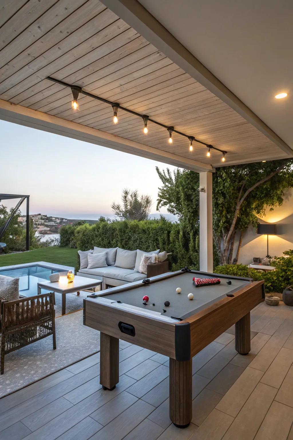 A multi-functional outdoor space with a game table and restful lounge.