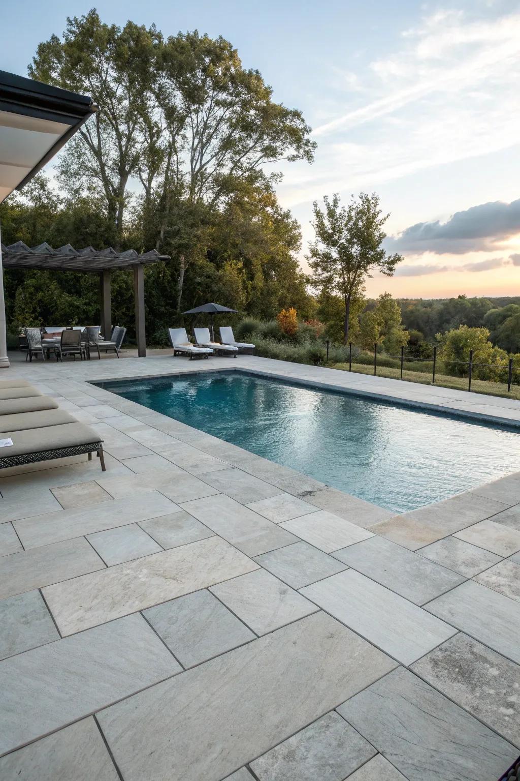 Appreciate toughness and style with a stone and tile pool deck.