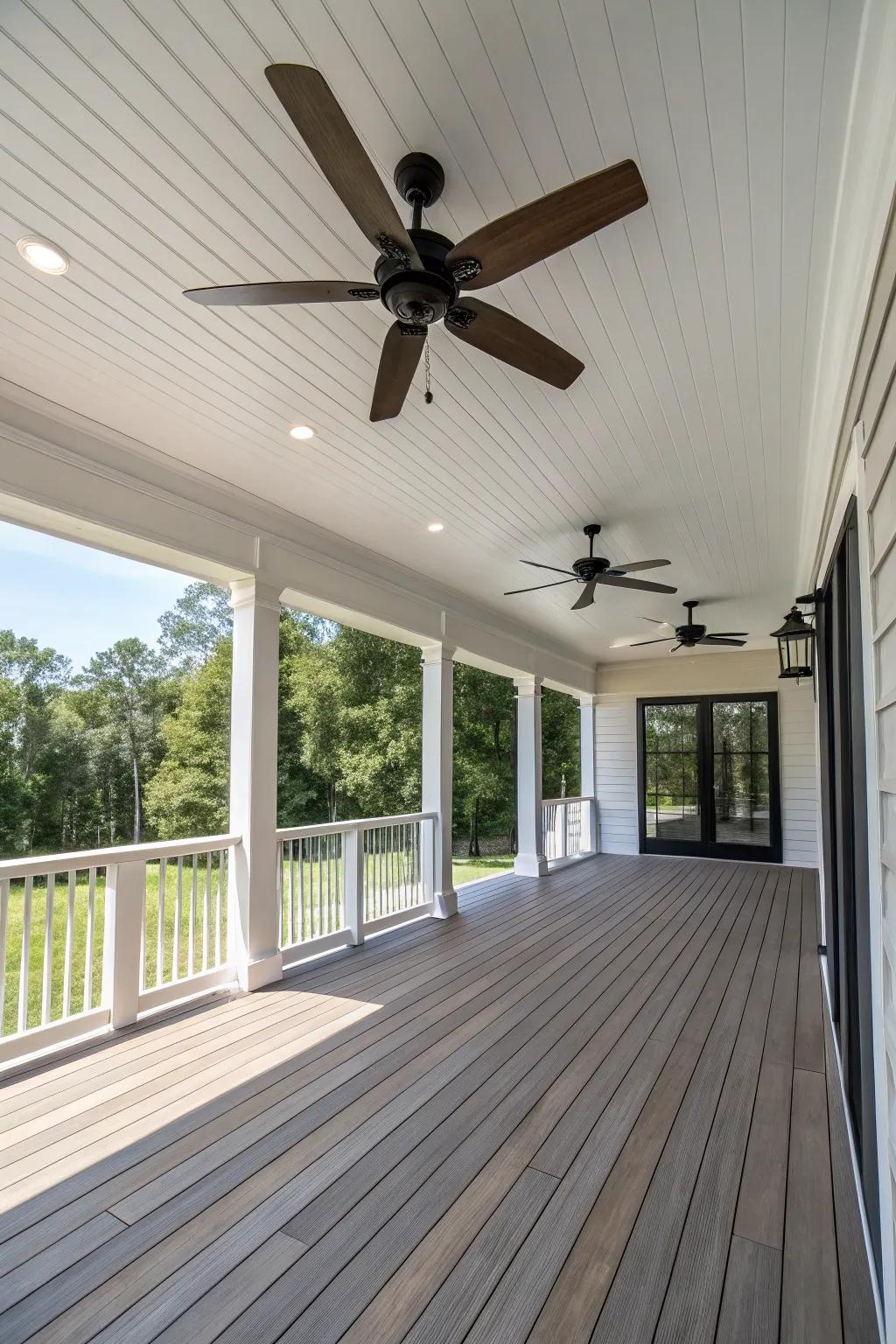 A porch expansion with a modern ceiling fan.